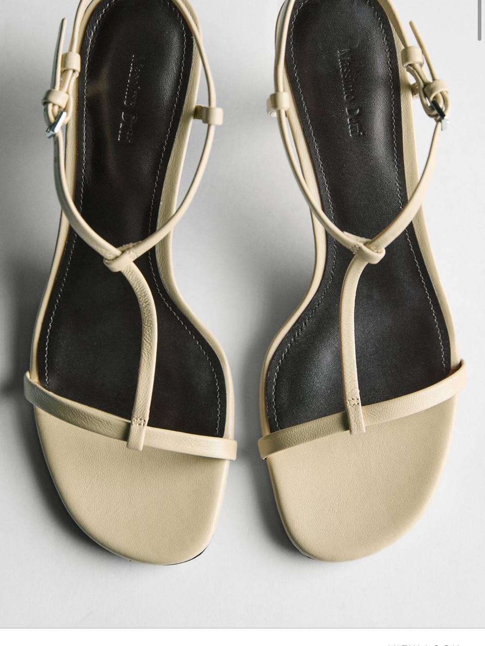 Minimal T-Strap Sandals in Cream - Women's
Heeled sandals